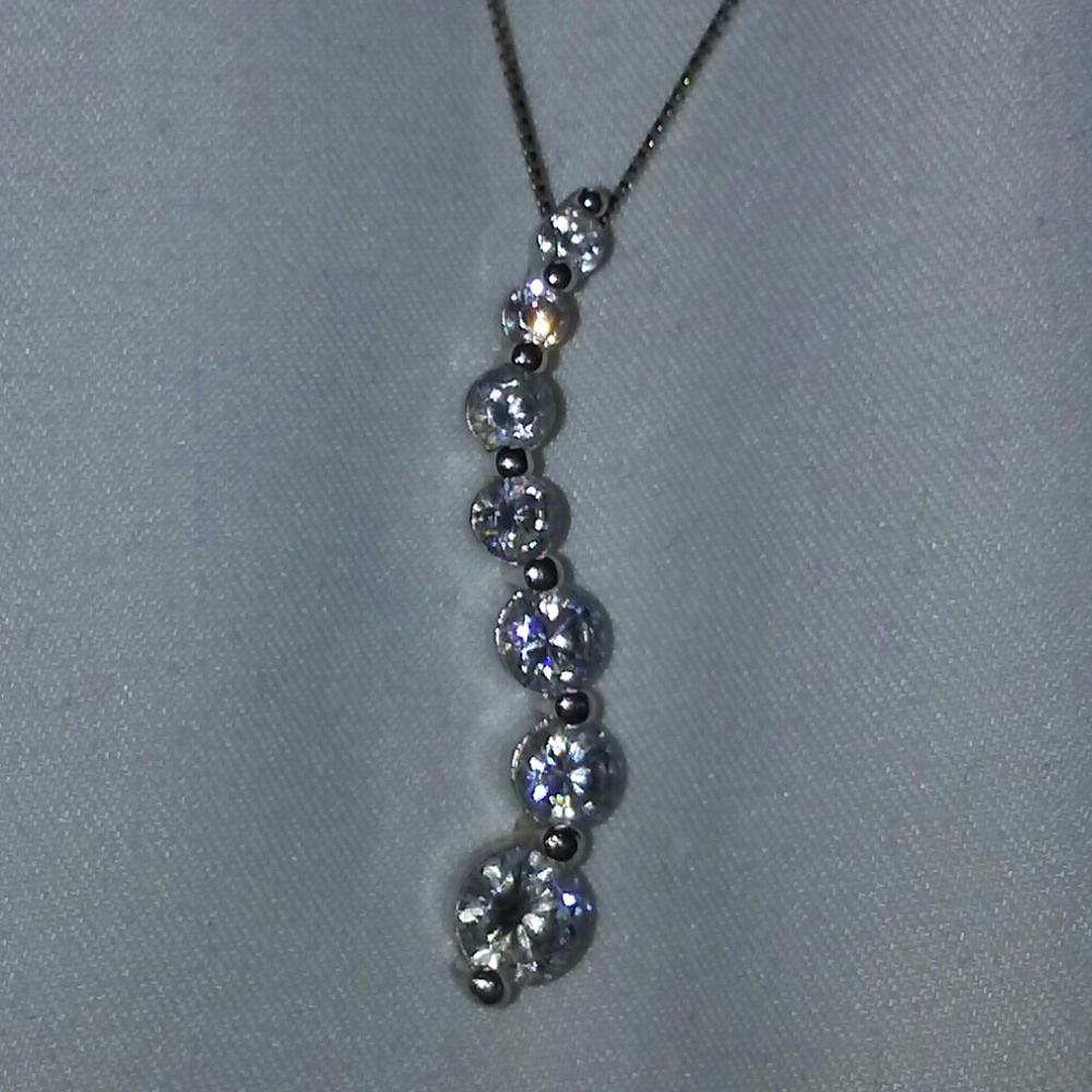 Sterling silver cubic zirconia s-shaped pendant